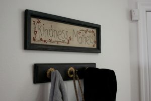 Framed crosstitch that says kindness matters